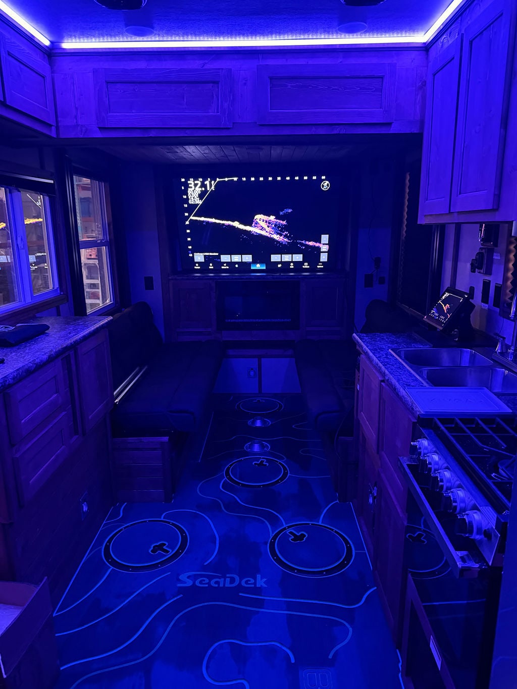BlueWater fish house with custom SeaDek flooring and integrated Garmin display