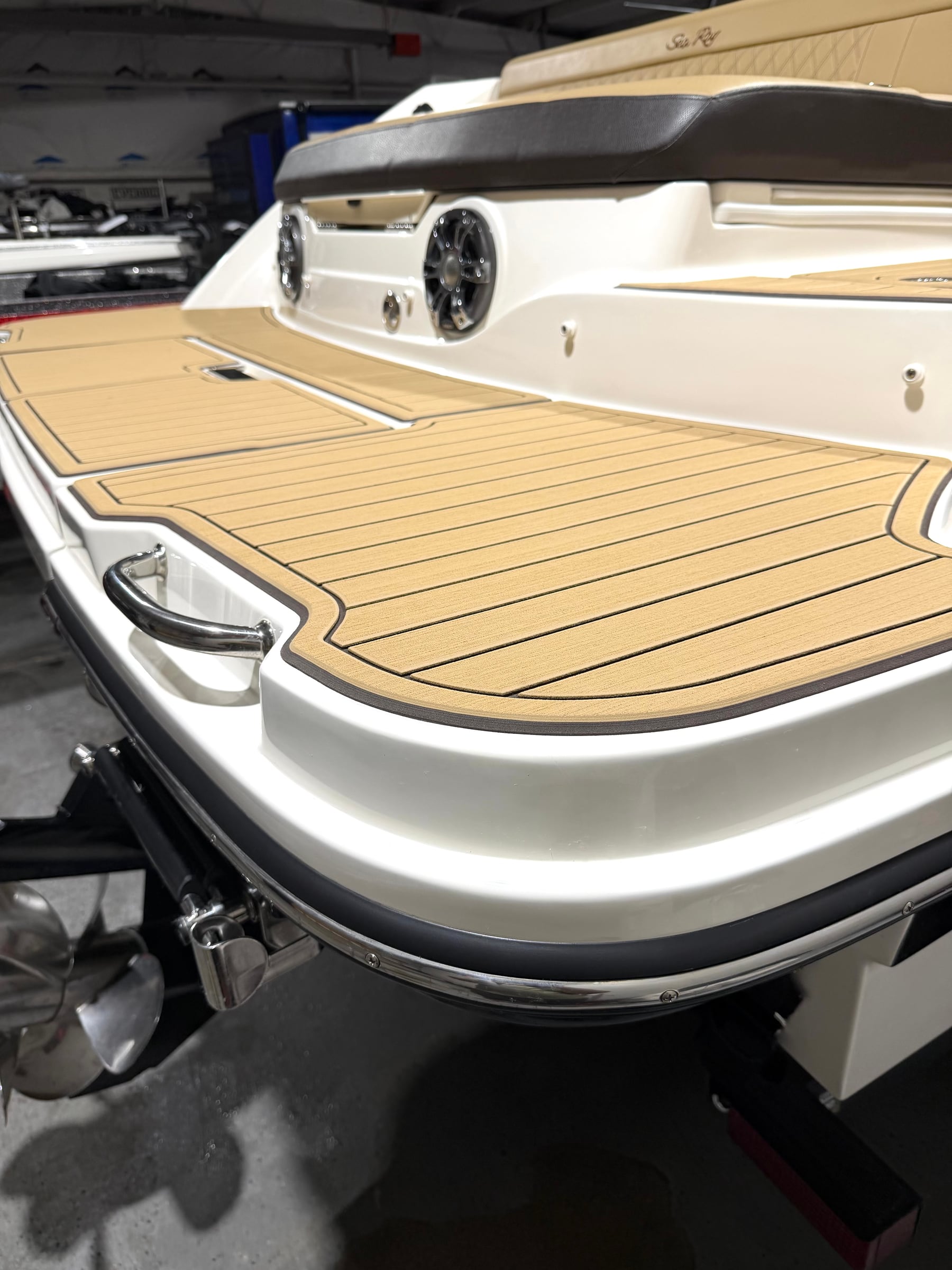 Custom tan SeaDek installed on a boat swim platform