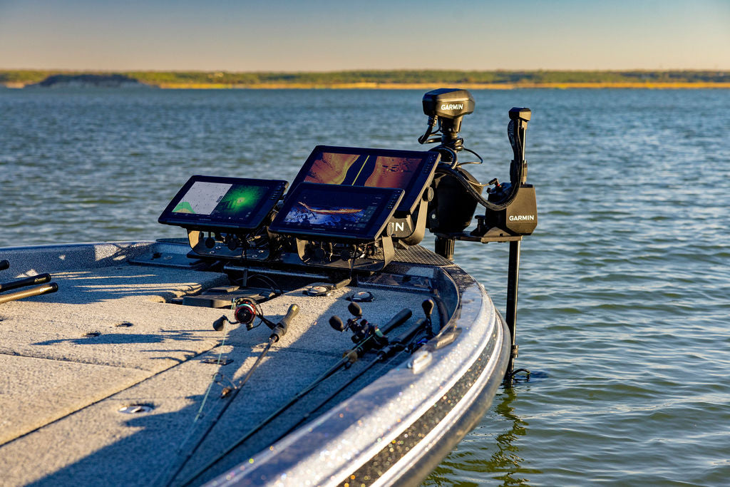 Garmin marine electronics installed at the bow of a fishing boat on the water